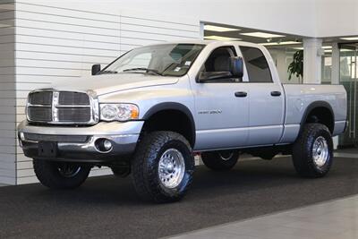 2004 Dodge Ram 2500 SLT 4dr Quad Cab SLT  1-OWNER* 6-SPEED MANUAL* 5.9L HIGH OUTPUT* NEW 3 "BILSTEIN LEVEL KIT* BILSTEIN 5100 SHOCKS* NEW 35 " NITTO G3 10-PLYs* REAR AIR BAGS* SPRAY IN BED LINER* AFE COLD AIR INTAKE - Photo 1 - Portland, OR 97230