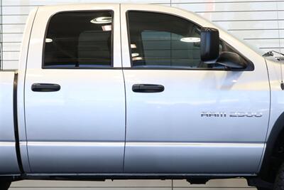 2004 Dodge Ram 2500 SLT 4dr Quad Cab SLT  1-OWNER* 6-SPEED MANUAL* 5.9L HIGH OUTPUT* NEW 3 "BILSTEIN LEVEL KIT* BILSTEIN 5100 SHOCKS* NEW 35 " NITTO G3 10-PLYs* REAR AIR BAGS* SPRAY IN BED LINER* AFE COLD AIR INTAKE - Photo 59 - Portland, OR 97230