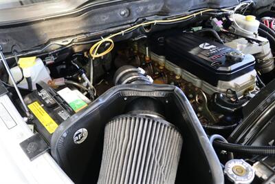 2004 Dodge Ram 2500 SLT 4dr Quad Cab SLT  1-OWNER* 6-SPEED MANUAL* 5.9L HIGH OUTPUT* NEW 3 "BILSTEIN LEVEL KIT* BILSTEIN 5100 SHOCKS* NEW 35 " NITTO G3 10-PLYs* REAR AIR BAGS* SPRAY IN BED LINER* AFE COLD AIR INTAKE - Photo 40 - Portland, OR 97230