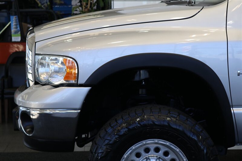 2004 Dodge Ram 2500 SLT 4dr Quad Cab SLT  1-OWNER* 6-SPEED MANUAL* 5.9L HIGH OUTPUT* NEW 3 "BILSTEIN LEVEL KIT* BILSTEIN 5100 SHOCKS* NEW 35 " NITTO G3 10-PLYs* REAR AIR BAGS* SPRAY IN BED LINER* AFE COLD AIR INTAKE - Photo 56 - Portland, OR 97230