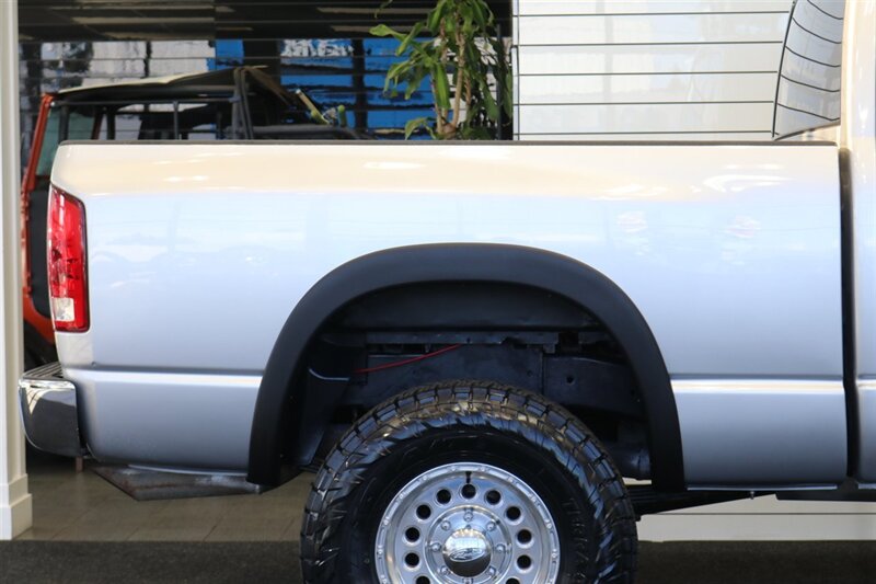 2004 Dodge Ram 2500 SLT 4dr Quad Cab SLT  1-OWNER* 6-SPEED MANUAL* 5.9L HIGH OUTPUT* NEW 3 "BILSTEIN LEVEL KIT* BILSTEIN 5100 SHOCKS* NEW 35 " NITTO G3 10-PLYs* REAR AIR BAGS* SPRAY IN BED LINER* AFE COLD AIR INTAKE - Photo 61 - Portland, OR 97230