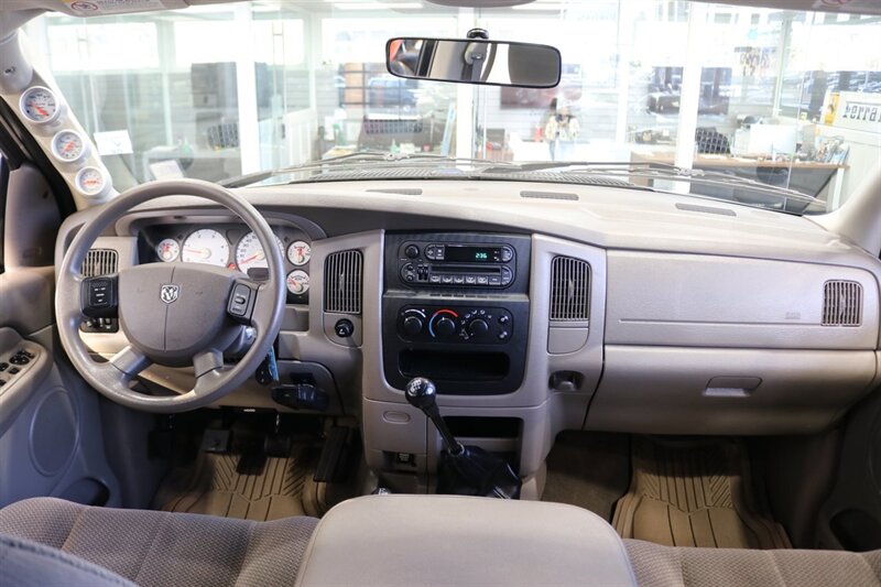 2004 Dodge Ram 2500 SLT 4dr Quad Cab SLT  1-OWNER* 6-SPEED MANUAL* 5.9L HIGH OUTPUT* NEW 3 "BILSTEIN LEVEL KIT* BILSTEIN 5100 SHOCKS* NEW 35 " NITTO G3 10-PLYs* REAR AIR BAGS* SPRAY IN BED LINER* AFE COLD AIR INTAKE - Photo 19 - Portland, OR 97230