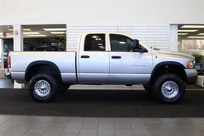 2004 Dodge Ram 2500 SLT 4dr Quad Cab SLT  1-OWNER* 6-SPEED MANUAL* 5.9L HIGH OUTPUT* NEW 3 "BILSTEIN LEVEL KIT* BILSTEIN 5100 SHOCKS* NEW 35 " NITTO G3 10-PLYs* REAR AIR BAGS* SPRAY IN BED LINER* AFE COLD AIR INTAKE - Photo 5 - Portland, OR 97230