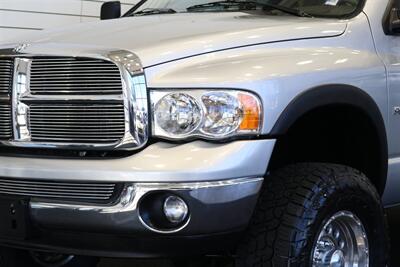 2004 Dodge Ram 2500 SLT 4dr Quad Cab SLT  1-OWNER* 6-SPEED MANUAL* 5.9L HIGH OUTPUT* NEW 3 "BILSTEIN LEVEL KIT* BILSTEIN 5100 SHOCKS* NEW 35 " NITTO G3 10-PLYs* REAR AIR BAGS* SPRAY IN BED LINER* AFE COLD AIR INTAKE - Photo 12 - Portland, OR 97230