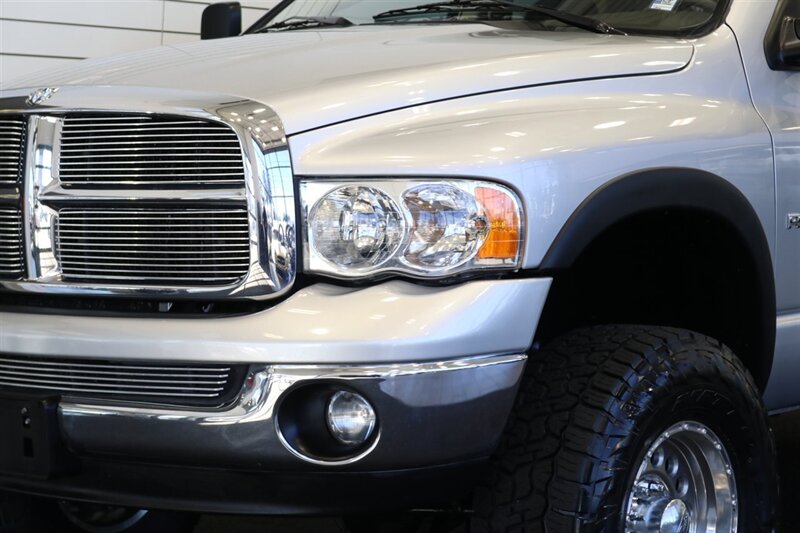 2004 Dodge Ram 2500 SLT 4dr Quad Cab SLT  1-OWNER* 6-SPEED MANUAL* 5.9L HIGH OUTPUT* NEW 3 "BILSTEIN LEVEL KIT* BILSTEIN 5100 SHOCKS* NEW 35 " NITTO G3 10-PLYs* REAR AIR BAGS* SPRAY IN BED LINER* AFE COLD AIR INTAKE - Photo 12 - Portland, OR 97230