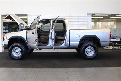 2004 Dodge Ram 2500 SLT 4dr Quad Cab SLT  1-OWNER* 6-SPEED MANUAL* 5.9L HIGH OUTPUT* NEW 3 "BILSTEIN LEVEL KIT* BILSTEIN 5100 SHOCKS* NEW 35 " NITTO G3 10-PLYs* REAR AIR BAGS* SPRAY IN BED LINER* AFE COLD AIR INTAKE - Photo 10 - Portland, OR 97230
