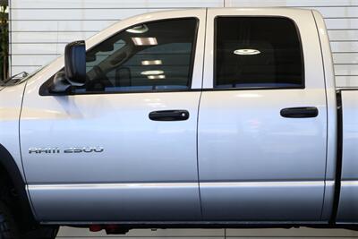 2004 Dodge Ram 2500 SLT 4dr Quad Cab SLT  1-OWNER* 6-SPEED MANUAL* 5.9L HIGH OUTPUT* NEW 3 "BILSTEIN LEVEL KIT* BILSTEIN 5100 SHOCKS* NEW 35 " NITTO G3 10-PLYs* REAR AIR BAGS* SPRAY IN BED LINER* AFE COLD AIR INTAKE - Photo 58 - Portland, OR 97230