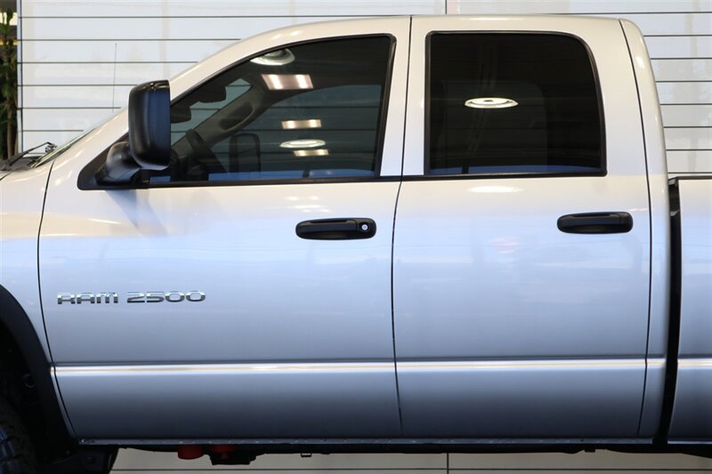 2004 Dodge Ram 2500 SLT 4dr Quad Cab SLT  1-OWNER* 6-SPEED MANUAL* 5.9L HIGH OUTPUT* NEW 3 "BILSTEIN LEVEL KIT* BILSTEIN 5100 SHOCKS* NEW 35 " NITTO G3 10-PLYs* REAR AIR BAGS* SPRAY IN BED LINER* AFE COLD AIR INTAKE - Photo 58 - Portland, OR 97230