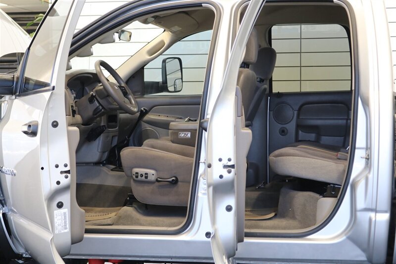2004 Dodge Ram 2500 SLT 4dr Quad Cab SLT  1-OWNER* 6-SPEED MANUAL* 5.9L HIGH OUTPUT* NEW 3 "BILSTEIN LEVEL KIT* BILSTEIN 5100 SHOCKS* NEW 35 " NITTO G3 10-PLYs* REAR AIR BAGS* SPRAY IN BED LINER* AFE COLD AIR INTAKE - Photo 48 - Portland, OR 97230