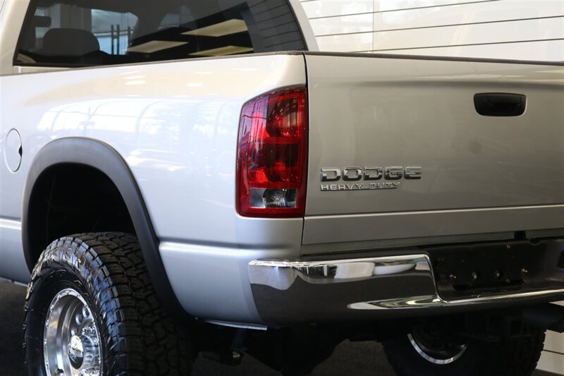 2004 Dodge Ram 2500 SLT 4dr Quad Cab SLT  1-OWNER* 6-SPEED MANUAL* 5.9L HIGH OUTPUT* NEW 3 "BILSTEIN LEVEL KIT* BILSTEIN 5100 SHOCKS* NEW 35 " NITTO G3 10-PLYs* REAR AIR BAGS* SPRAY IN BED LINER* AFE COLD AIR INTAKE - Photo 93 - Portland, OR 97230