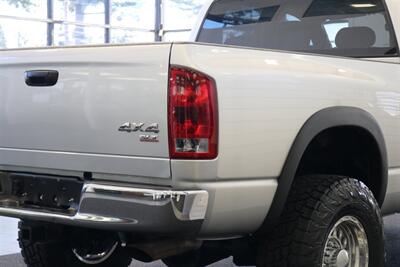 2004 Dodge Ram 2500 SLT 4dr Quad Cab SLT  1-OWNER* 6-SPEED MANUAL* 5.9L HIGH OUTPUT* NEW 3 "BILSTEIN LEVEL KIT* BILSTEIN 5100 SHOCKS* NEW 35 " NITTO G3 10-PLYs* REAR AIR BAGS* SPRAY IN BED LINER* AFE COLD AIR INTAKE - Photo 92 - Portland, OR 97230