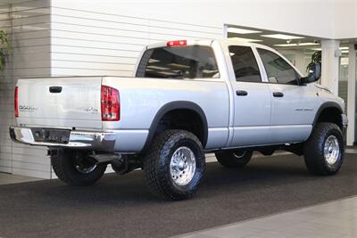 2004 Dodge Ram 2500 SLT 4dr Quad Cab SLT  1-OWNER* 6-SPEED MANUAL* 5.9L HIGH OUTPUT* NEW 3 "BILSTEIN LEVEL KIT* BILSTEIN 5100 SHOCKS* NEW 35 " NITTO G3 10-PLYs* REAR AIR BAGS* SPRAY IN BED LINER* AFE COLD AIR INTAKE - Photo 7 - Portland, OR 97230