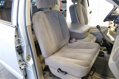 2004 Dodge Ram 2500 SLT 4dr Quad Cab SLT  1-OWNER* 6-SPEED MANUAL* 5.9L HIGH OUTPUT* NEW 3 "BILSTEIN LEVEL KIT* BILSTEIN 5100 SHOCKS* NEW 35 " NITTO G3 10-PLYs* REAR AIR BAGS* SPRAY IN BED LINER* AFE COLD AIR INTAKE - Photo 17 - Portland, OR 97230