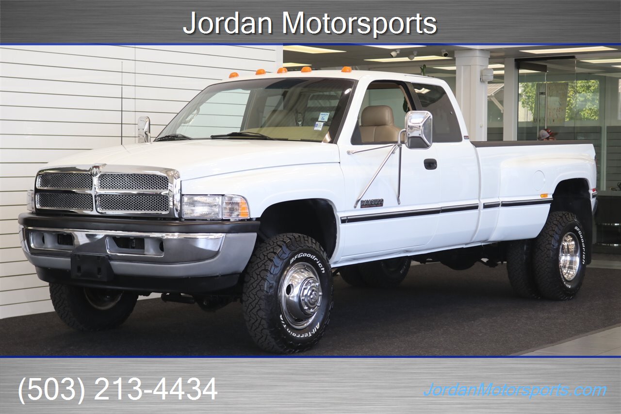 1997 Dodge Ram 3500 Laramie SLT 1-OWNER* 100% RUST & CORROSION FREE* 12-VALVE 5.9L CUMMINS* NEW 32 " BFG 10-PLYs* LARAMIE LEATHER INTERIOR* SPRAY IN BED LINER* FULLY SERVICED* ALL ORIGINAL BOOKS & KEYS - Photo 1 - Portland, OR 97230