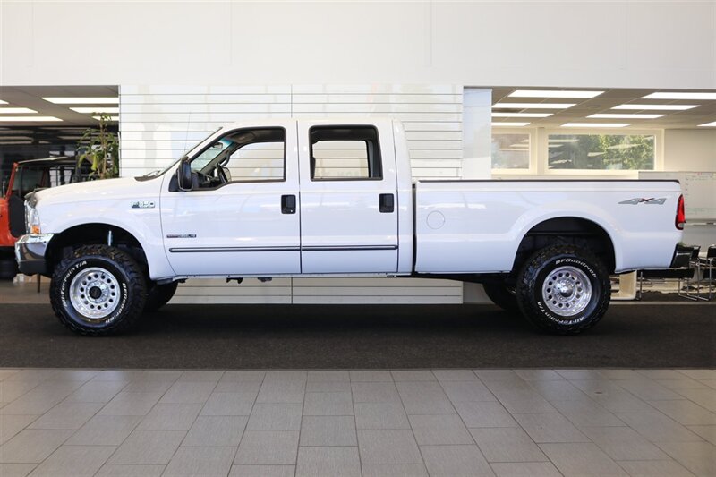 1999 Ford F-350 XLT  1-OWNER* 34K MILES ONLY* 6-SPEED MANUAL* NEW 35 " BFG KO3s W/ NEW 17 "ROCK CRUSHERS* FULLY SERVICED* ALL RECORDS SINCE NEW* SPRAY IN BED LINER* 2.5 " BILSTEIN LEVEL KIT* CALIFORNIA TRUCK SINCE NEW - Photo 4 - Portland, OR 97230