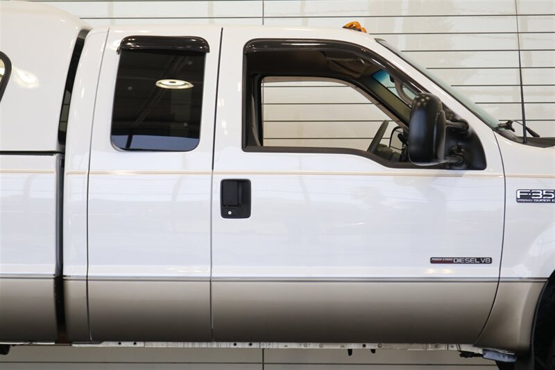 2000 Ford F-350 Super Duty Lariat 4dr SuperCab Lariat  1-FAMILY OWNED* 100% RUST FREE / ACCIDENT FREE* NEW 33 "BFG KO3* NEW 2.5 "LEVELING KIT* CANOPY / TRAILER BRAKES / LINEX BED LINER* BD ENGINE BREAK / BANKS MONSTER EXHAUST - Photo 51 - Portland, OR 97230