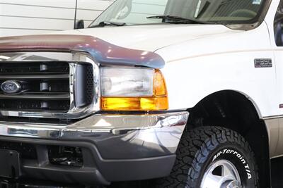 2000 Ford F-350 Super Duty Lariat 4dr SuperCab Lariat  1-FAMILY OWNED* 100% RUST FREE / ACCIDENT FREE* NEW 33 "BFG KO3* NEW 2.5 "LEVELING KIT* CANOPY / TRAILER BRAKES / LINEX BED LINER* BD ENGINE BREAK / BANKS MONSTER EXHAUST - Photo 12 - Portland, OR 97230