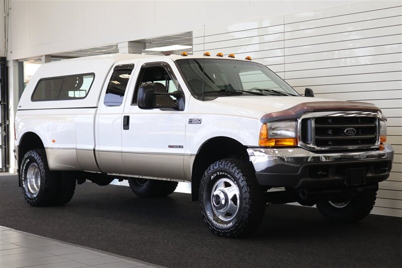 2000 Ford F-350 Super Duty Lariat 4dr SuperCab Lariat  1-FAMILY OWNED* 100% RUST FREE / ACCIDENT FREE* NEW 33 "BFG KO3* NEW 2.5 "LEVELING KIT* CANOPY / TRAILER BRAKES / LINEX BED LINER* BD ENGINE BREAK / BANKS MONSTER EXHAUST - Photo 2 - Portland, OR 97230