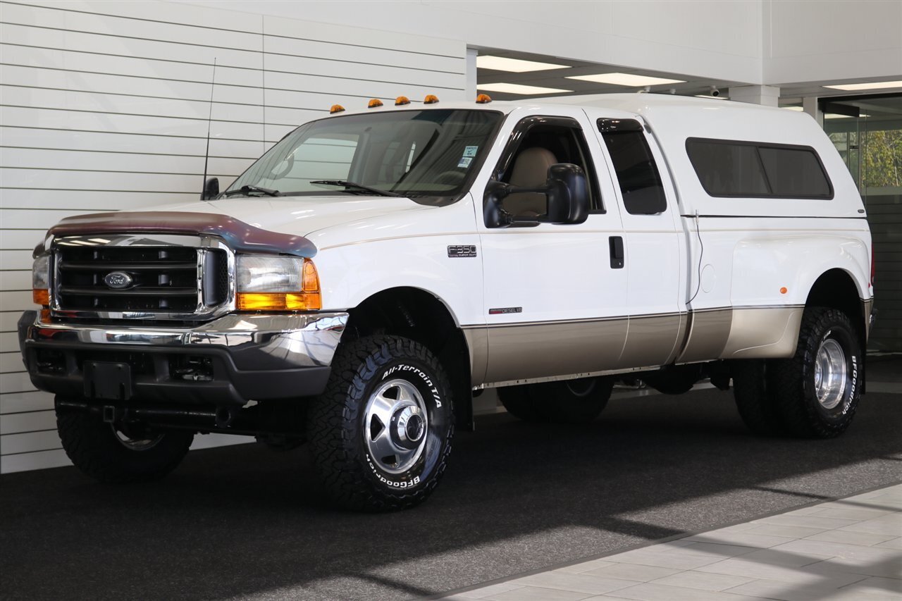 2000 Ford F-350 Super Duty Lariat 4dr SuperCab Lariat  1-FAMILY OWNED* 100% RUST FREE / ACCIDENT FREE* NEW 33 "BFG KO3* NEW 2.5 "LEVELING KIT* CANOPY / TRAILER BRAKES / LINEX BED LINER* BD ENGINE BREAK / BANKS MONSTER EXHAUST - Photo 1 - Portland, OR 97230