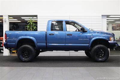 2004 Dodge Ram 2500 SLT  1-OWNER* RUST FREE* 4 "LIFT* NEW 35 " TOYO R/T TIRES* SPRAY IN BED LINER* REAR AIR BAGS* NEW BALL JOINTS / BRAKES / STEERING BOX / FLUIDS / AC CHARGE* OFF ROAD BUMPERS PAINT MATCHED - Photo 4 - Portland, OR 97230