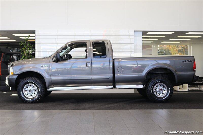 2003 Ford F-350 XLT  SPORT PKG* 1-OWNER* 100% RUST FREE* NEW 33 " BFG KO3s 10-PLY* 100% STOCK & ORIGINAL W/4 " EXHAUST & AFE INTAKE* 5TH WHEEL RAILS* DEALER SERVICED W/ALL RECORDS* - Photo 3 - Portland, OR 97230