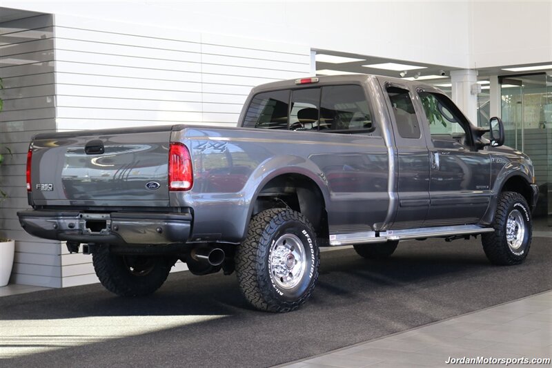 2003 Ford F-350 XLT  SPORT PKG* 1-OWNER* 100% RUST FREE* NEW 33 " BFG KO3s 10-PLY* 100% STOCK & ORIGINAL W/4 " EXHAUST & AFE INTAKE* 5TH WHEEL RAILS* DEALER SERVICED W/ALL RECORDS* - Photo 6 - Portland, OR 97230