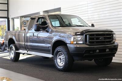 2003 Ford F-350 XLT  SPORT PKG* 1-OWNER* 100% RUST FREE* NEW 33 " BFG KO3s 10-PLY* 100% STOCK & ORIGINAL W/4 " EXHAUST & AFE INTAKE* 5TH WHEEL RAILS* DEALER SERVICED W/ALL RECORDS* - Photo 2 - Portland, OR 97230