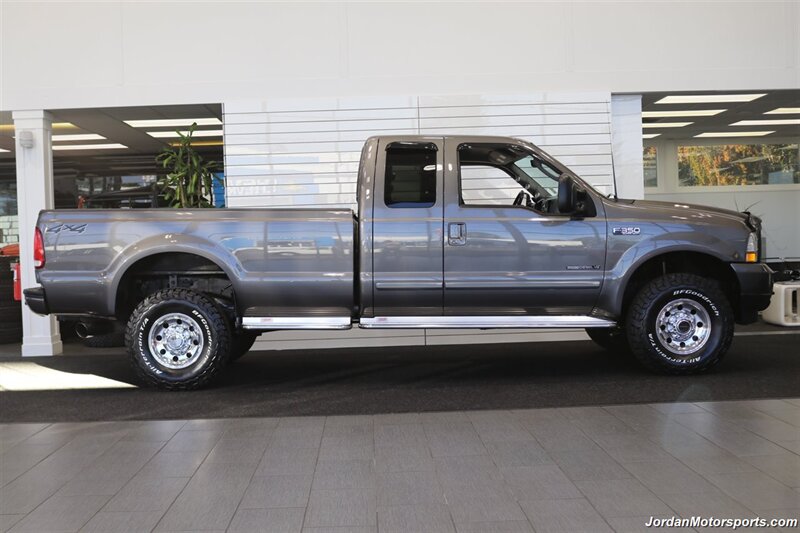 2003 Ford F-350 XLT  SPORT PKG* 1-OWNER* 100% RUST FREE* NEW 33 " BFG KO3s 10-PLY* 100% STOCK & ORIGINAL W/4 " EXHAUST & AFE INTAKE* 5TH WHEEL RAILS* DEALER SERVICED W/ALL RECORDS* - Photo 4 - Portland, OR 97230