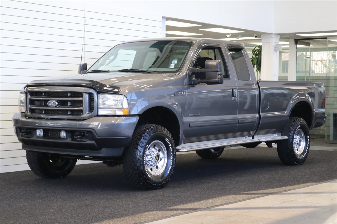 2003 Ford F-350 Super Duty XLT 4dr SuperCab XLT  LONG BED 7.3L 100% RUST FREE* NEW 2.75 " LEVEL KIT W/ BILSTEIN 5100 SHOCKS & 33 " BFG KO3 10-PLYs* NEW BRAKES - UPPER&LOWER BALL JOINTS-DIFF FLUIDS-BELTS-AC SERVICE-SEALS-WARREN HUBS* S&B INTAKE - Photo 1 - Portland, OR 97230