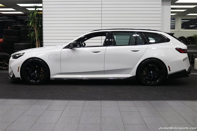 2025 BMW M5 Touring 141K MSRP* CARBON CERAMIC BRAKES-EXECUTIVE PKG - M-DRIVER PKG* CARBON FIBER FRONT SPLITTER - CARBON REAR DIFFUESER - CARBON SIDE SKIRTS - H&R LOWERING SPRINGS* DOWN PIPES & COLD AIR INTAKES - Photo 4 - Portland, OR 97230