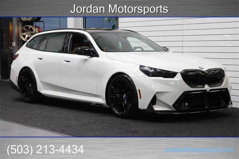 2025 BMW M5 Touring  141K MSRP* CARBON CERAMIC BRAKES-EXECUTIVE PKG - M-DRIVER PKG* CARBON FIBER FRONT SPLITTER - CARBON REAR DIFFUESER - CARBON SIDE SKIRTS - H&R LOWERING SPRINGS* DOWN PIPES & COLD AIR INTAKES