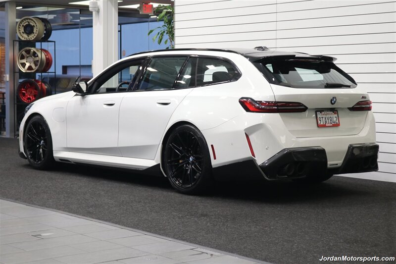 2025 BMW M5 Touring 141K MSRP* CARBON CERAMIC BRAKES-EXECUTIVE PKG - M-DRIVER PKG* CARBON FIBER FRONT SPLITTER - CARBON REAR DIFFUESER - CARBON SIDE SKIRTS - H&R LOWERING SPRINGS* DOWN PIPES & COLD AIR INTAKES - Photo 6 - Portland, OR 97230