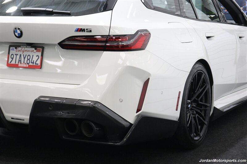 2025 BMW M5 Touring 141K MSRP* CARBON CERAMIC BRAKES-EXECUTIVE PKG - M-DRIVER PKG* CARBON FIBER FRONT SPLITTER - CARBON REAR DIFFUESER - CARBON SIDE SKIRTS - H&R LOWERING SPRINGS* DOWN PIPES & COLD AIR INTAKES - Photo 12 - Portland, OR 97230