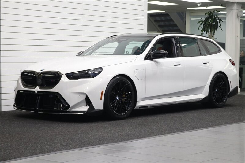 2025 BMW M5 Touring  141K MSRP* CARBON CERAMIC BRAKES-EXECUTIVE PKG - M-DRIVER PKG* CARBON FIBER FRONT SPLITTER - CARBON REAR DIFFUESER - CARBON SIDE SKIRTS - H&R LOWERING SPRINGS* DOWN PIPES & COLD AIR INTAKES