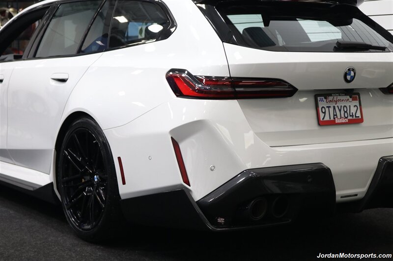 2025 BMW M5 Touring 141K MSRP* CARBON CERAMIC BRAKES-EXECUTIVE PKG - M-DRIVER PKG* CARBON FIBER FRONT SPLITTER - CARBON REAR DIFFUESER - CARBON SIDE SKIRTS - H&R LOWERING SPRINGS* DOWN PIPES & COLD AIR INTAKES - Photo 13 - Portland, OR 97230