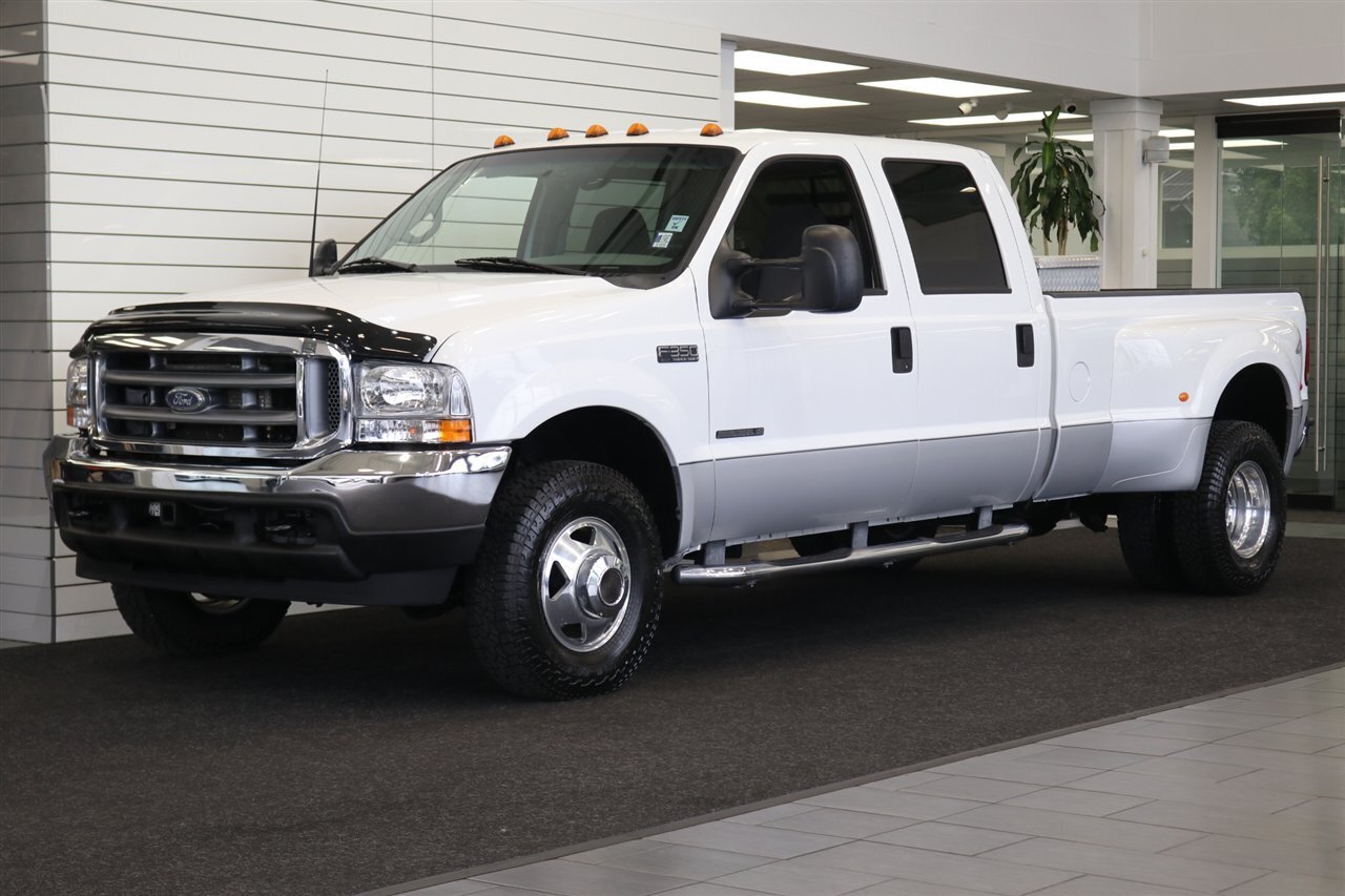 2002 Ford F-350  1-OWNER* 100% RUST FREE* LINEX BED LINER* NEW BRAKES / ROTORS / CALIPERS / BRAKE FLUID / AC SERVICE & RECHARGE / CAMPER TIE DOWNS / COOLANT FLUSH / NEW WIPERS / NEW DOOR LOCK ACTUATORS / 2-KEYS - Photo 1 - Portland, OR 97230