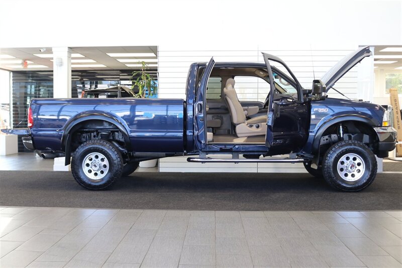 2002 Ford F-350 XLT  1-OREGON OWNER* 100% RUST & CORROSION FREE* LONG BED* 3.73 REAR AXLE* NEW 34 " TOYO A/T III W/ NEW 16 "PRO COMP WHEELS* 05 GRILL* UPGRADED MIRRORS* BANKS EXHAUST* ALL BOOKS-WINDOW STICKER-KEYS* - Photo 11 - Portland, OR 97230