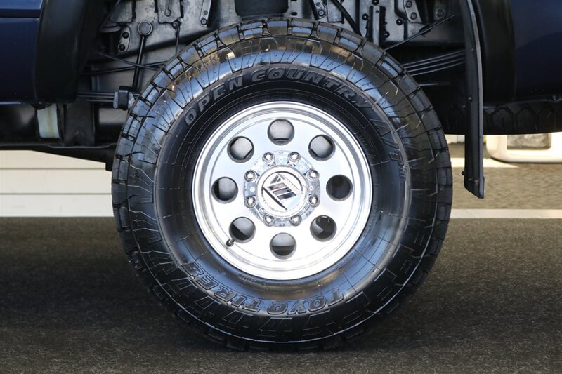 2002 Ford F-350 XLT  1-OREGON OWNER* 100% RUST & CORROSION FREE* LONG BED* 3.73 REAR AXLE* NEW 34 " TOYO A/T III W/ NEW 16 "PRO COMP WHEELS* 05 GRILL* UPGRADED MIRRORS* BANKS EXHAUST* ALL BOOKS-WINDOW STICKER-KEYS* - Photo 56 - Portland, OR 97230