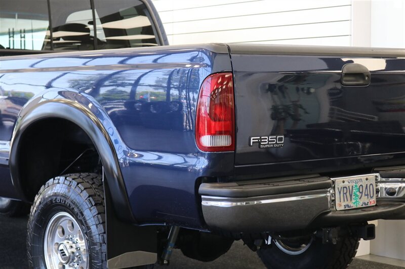 2002 Ford F-350 XLT  1-OREGON OWNER* 100% RUST & CORROSION FREE* LONG BED* 3.73 REAR AXLE* NEW 34 " TOYO A/T III W/ NEW 16 "PRO COMP WHEELS* 05 GRILL* UPGRADED MIRRORS* BANKS EXHAUST* ALL BOOKS-WINDOW STICKER-KEYS* - Photo 43 - Portland, OR 97230
