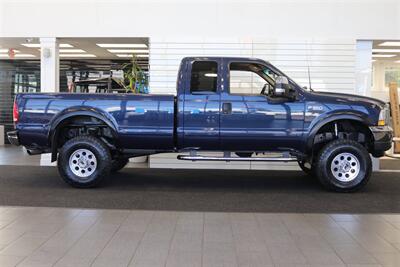 2002 Ford F-350 XLT  1-OREGON OWNER* 100% RUST & CORROSION FREE* LONG BED* 3.73 REAR AXLE* NEW 34 " TOYO A/T III W/ NEW 16 "PRO COMP WHEELS* 05 GRILL* UPGRADED MIRRORS* BANKS EXHAUST* ALL BOOKS-WINDOW STICKER-KEYS* - Photo 5 - Portland, OR 97230