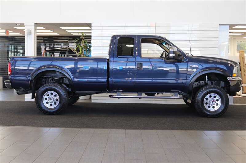 2002 Ford F-350 XLT  1-OREGON OWNER* 100% RUST & CORROSION FREE* LONG BED* 3.73 REAR AXLE* NEW 34 " TOYO A/T III W/ NEW 16 "PRO COMP WHEELS* 05 GRILL* UPGRADED MIRRORS* BANKS EXHAUST* ALL BOOKS-WINDOW STICKER-KEYS* - Photo 5 - Portland, OR 97230