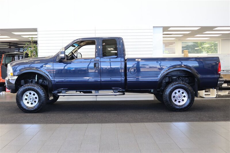 2002 Ford F-350 XLT  1-OREGON OWNER* 100% RUST & CORROSION FREE* LONG BED* 3.73 REAR AXLE* NEW 34 " TOYO A/T III W/ NEW 16 "PRO COMP WHEELS* 05 GRILL* UPGRADED MIRRORS* BANKS EXHAUST* ALL BOOKS-WINDOW STICKER-KEYS* - Photo 4 - Portland, OR 97230