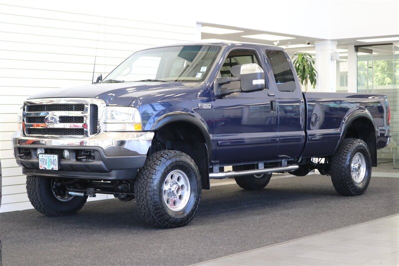 2002 Ford F-350 XLT  1-OREGON OWNER* 100% RUST & CORROSION FREE* LONG BED* 3.73 REAR AXLE* NEW 34 " TOYO A/T III W/ NEW 16 "PRO COMP WHEELS* 05 GRILL* UPGRADED MIRRORS* BANKS EXHAUST* ALL BOOKS-WINDOW STICKER-KEYS* - Photo 3 - Portland, OR 97230