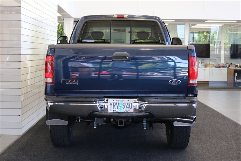 2002 Ford F-350 XLT  1-OREGON OWNER* 100% RUST & CORROSION FREE* LONG BED* 3.73 REAR AXLE* NEW 34 " TOYO A/T III W/ NEW 16 "PRO COMP WHEELS* 05 GRILL* UPGRADED MIRRORS* BANKS EXHAUST* ALL BOOKS-WINDOW STICKER-KEYS* - Photo 9 - Portland, OR 97230