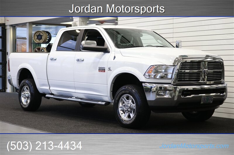 2011 RAM 2500 Laramie  1-OWNER* 100% RUST & CORROSION FREE* NAV & MOON ROOF* 100% ALL ORIGINAL* SPRAY IN BED LINER* HEATED & COOLED SEATS* PARKING SENSORS* ALL ORIGINAL BOOKS AND MANUALS AND 2 KEYS* PRE DEF