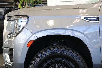 2022 GMC Yukon Denali  3.0L DURAMAX DIESEL 10SP AUTO LIFTED 4X4 35 " A/T TIRES FUEL OFF ROAD WHEELS POWER RUNNING BOARDS ONLY 57K MILES 1 OWNER LOCAL RIG - Photo 34 - Portland, OR 97230