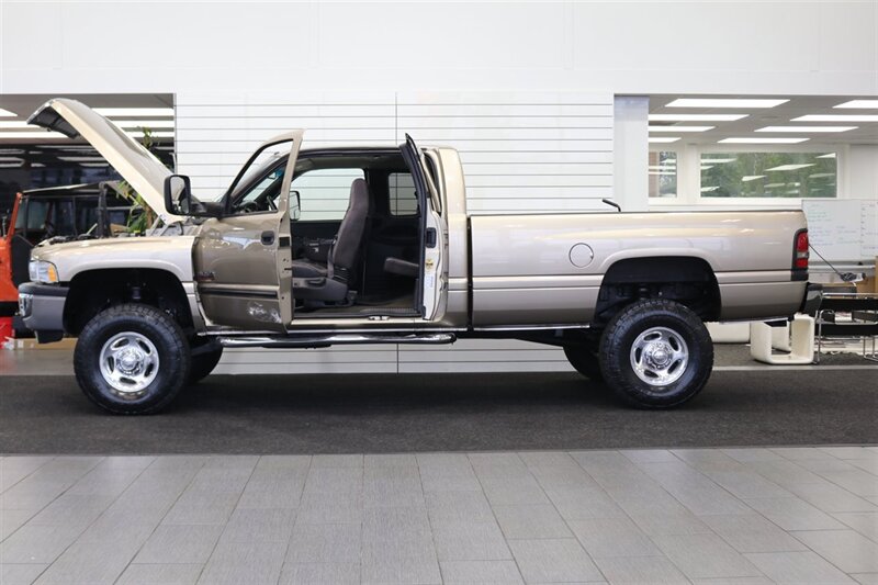 2002 Dodge Ram 2500 SLT  1-OWNER* 100% RUST FREE* 100% STOCK* NEW 3 " LEVEL KIT W/ BILSTEIN 5100* NEW 34 " TOYO A/T III 10-PLYs* NEW BRAKES-ROTORS-CALIPERS-BRAKE FLUID FLUSH-COOLANT FLUSH-AC SERVICE* HIGH OUTPUT* 6-SPEED - Photo 10 - Portland, OR 97230