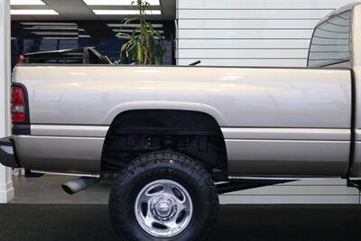 2002 Dodge Ram 2500 SLT  1-OWNER* 100% RUST FREE* 100% STOCK* NEW 3 " LEVEL KIT W/ BILSTEIN 5100* NEW 34 " TOYO A/T III 10-PLYs* NEW BRAKES-ROTORS-CALIPERS-BRAKE FLUID FLUSH-COOLANT FLUSH-AC SERVICE* HIGH OUTPUT* 6-SPEED - Photo 61 - Portland, OR 97230