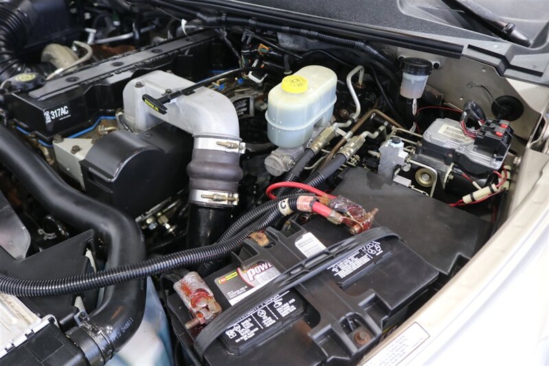 2002 Dodge Ram 2500 SLT  1-OWNER* 100% RUST FREE* 100% STOCK* NEW 3 " LEVEL KIT W/ BILSTEIN 5100* NEW 34 " TOYO A/T III 10-PLYs* NEW BRAKES-ROTORS-CALIPERS-BRAKE FLUID FLUSH-COOLANT FLUSH-AC SERVICE* HIGH OUTPUT* 6-SPEED - Photo 43 - Portland, OR 97230