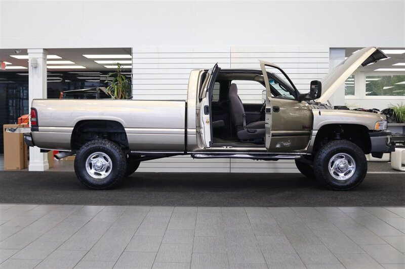 2002 Dodge Ram 2500 SLT  1-OWNER* 100% RUST FREE* 100% STOCK* NEW 3 " LEVEL KIT W/ BILSTEIN 5100* NEW 34 " TOYO A/T III 10-PLYs* NEW BRAKES-ROTORS-CALIPERS-BRAKE FLUID FLUSH-COOLANT FLUSH-AC SERVICE* HIGH OUTPUT* 6-SPEED - Photo 11 - Portland, OR 97230